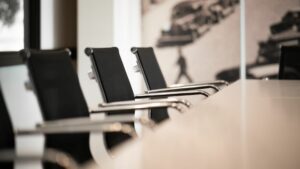 Chairs lined up near office desk